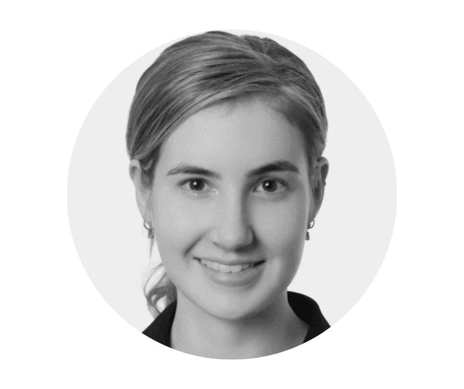 Meet our Babysitters Black and white headshot of a Cherished Cherubs Babysitter with light hair pulled back, smiling at the camera, shown in a circular frame on a white background—capturing the warmth and charm of Cherished Cherubs.